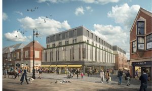 Modern mixed-use urban development with ground-floor retail, grocery store, and café beneath contemporary residential apartments in a vibrant pedestrian-friendly city center.