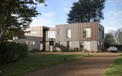 Contemporary two‑storey home with stone base, bronze cladding and large glazing featured in Architecture Magazine