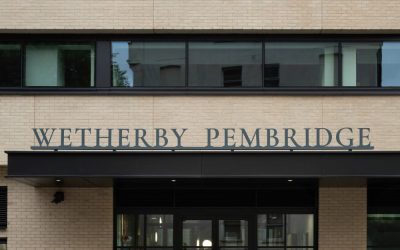 Modern brick building with glass entrance and Wetherby Pembridge signage featured in Architecture Magazine