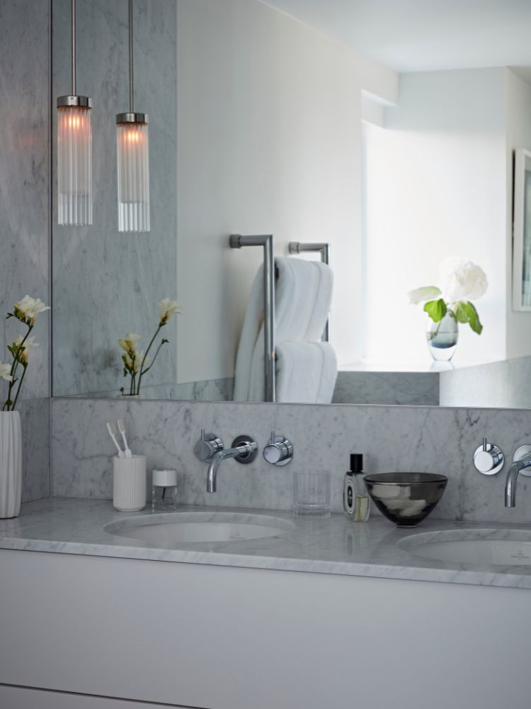 bathroom mirror and sink image by the built environment network